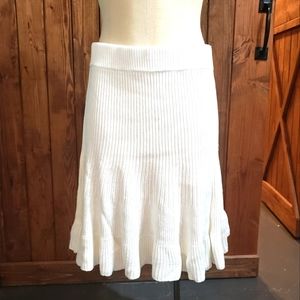 Solid gold knit mini skirt in Cream XL